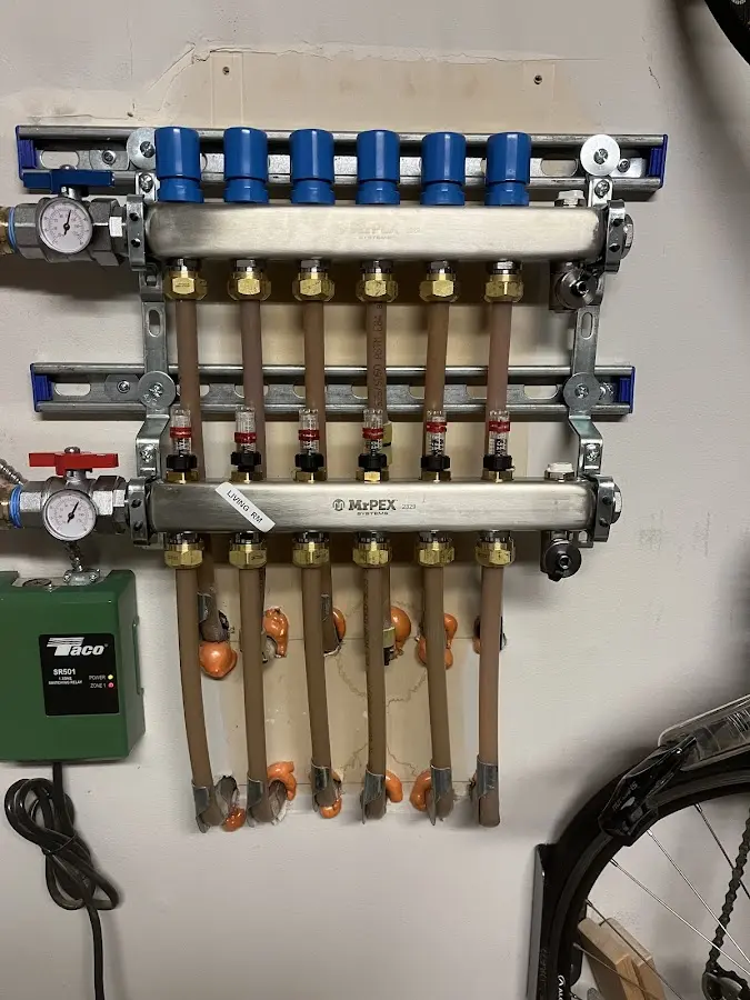 Plumber performing Water Heater Repair at a residential property in Molalla